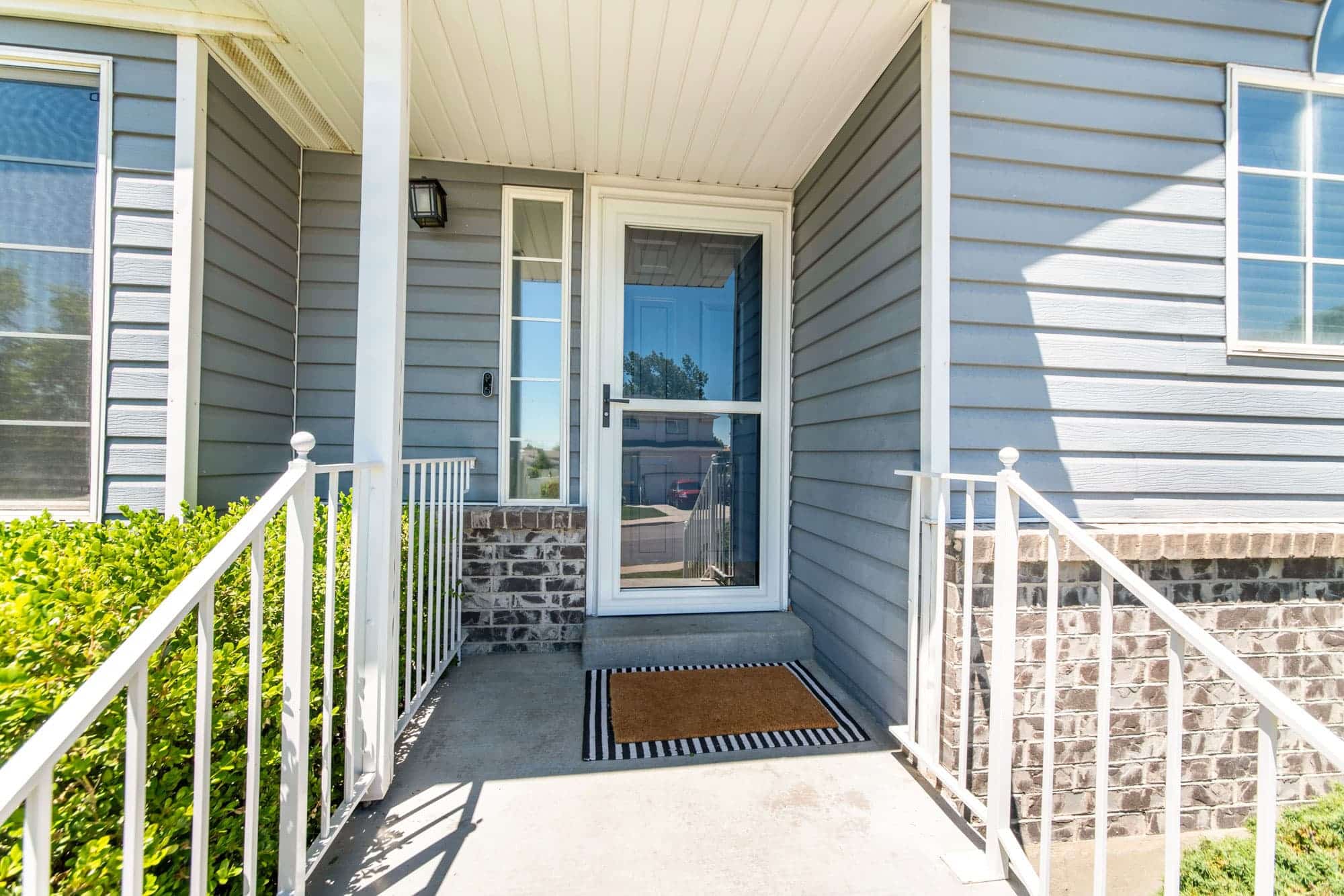 Storm door installed on a home entry