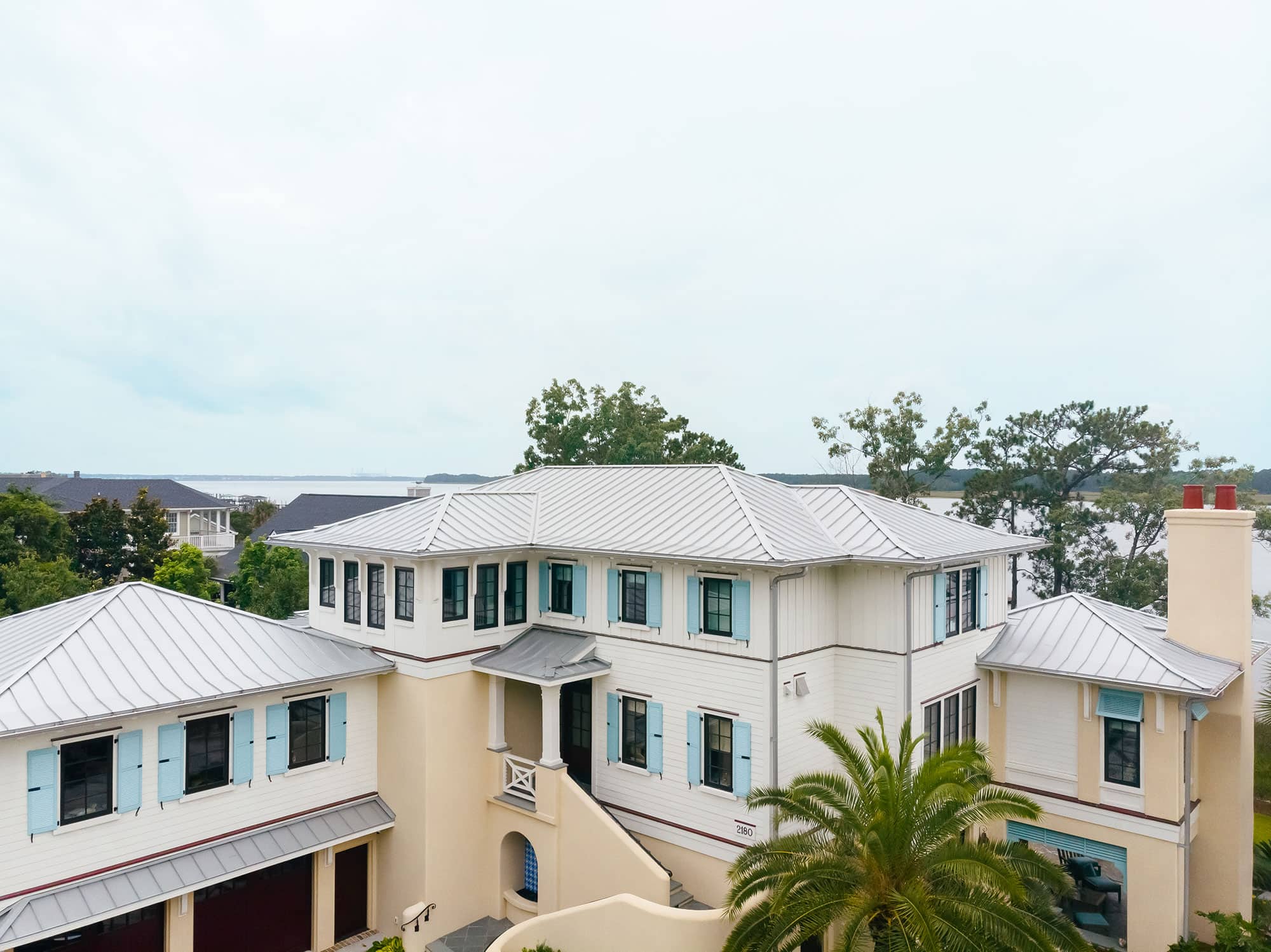 Grey metal roof on a coastal home