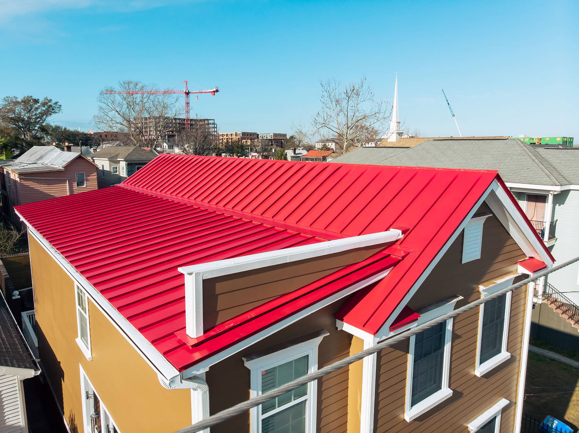 Red metal roof installation