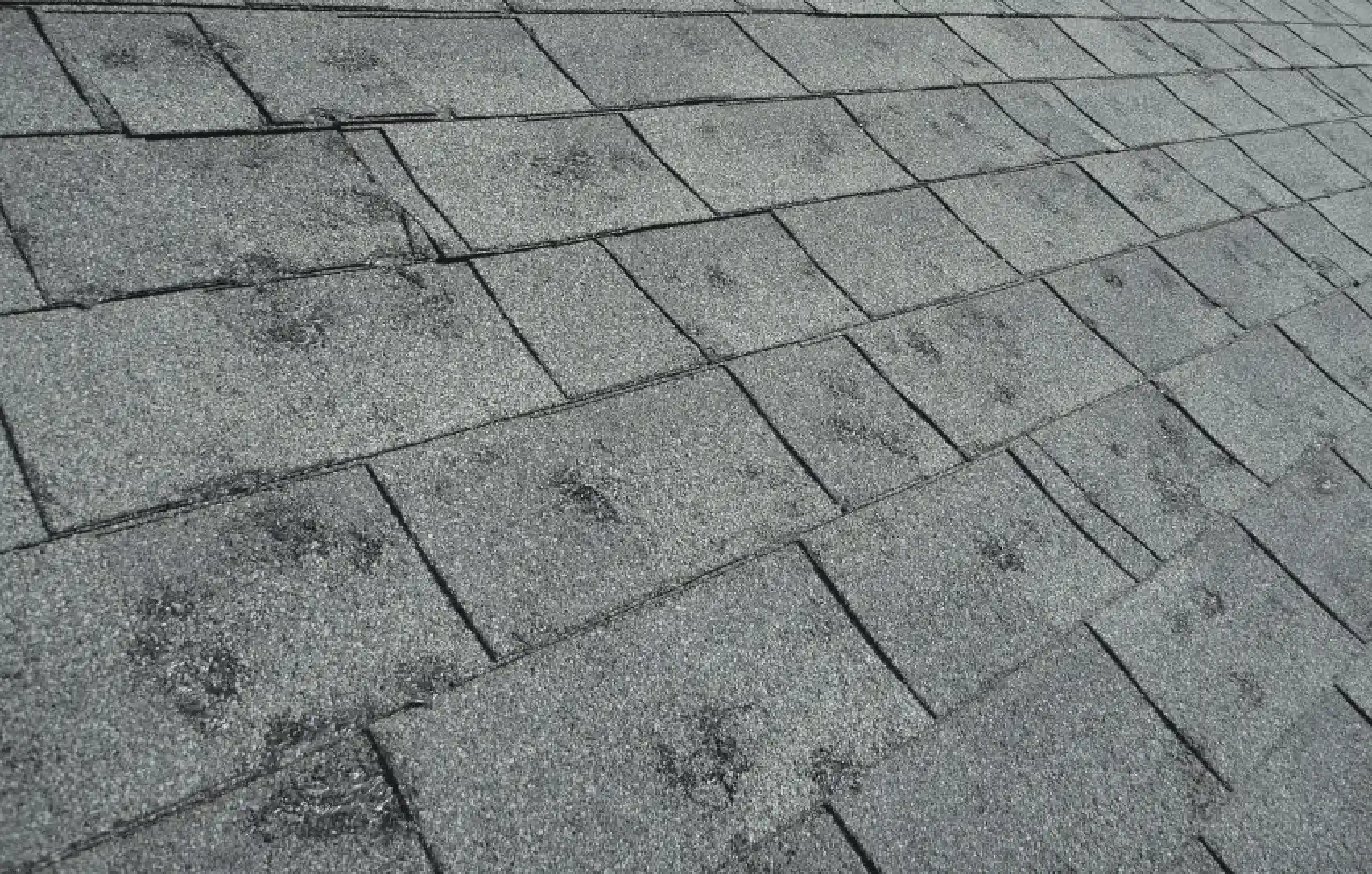 Shingles damaged from hail storms