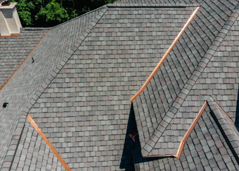 Copper flashing detail on a roof section