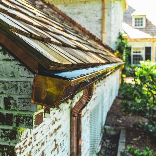 Close-up of copper gutters with patina