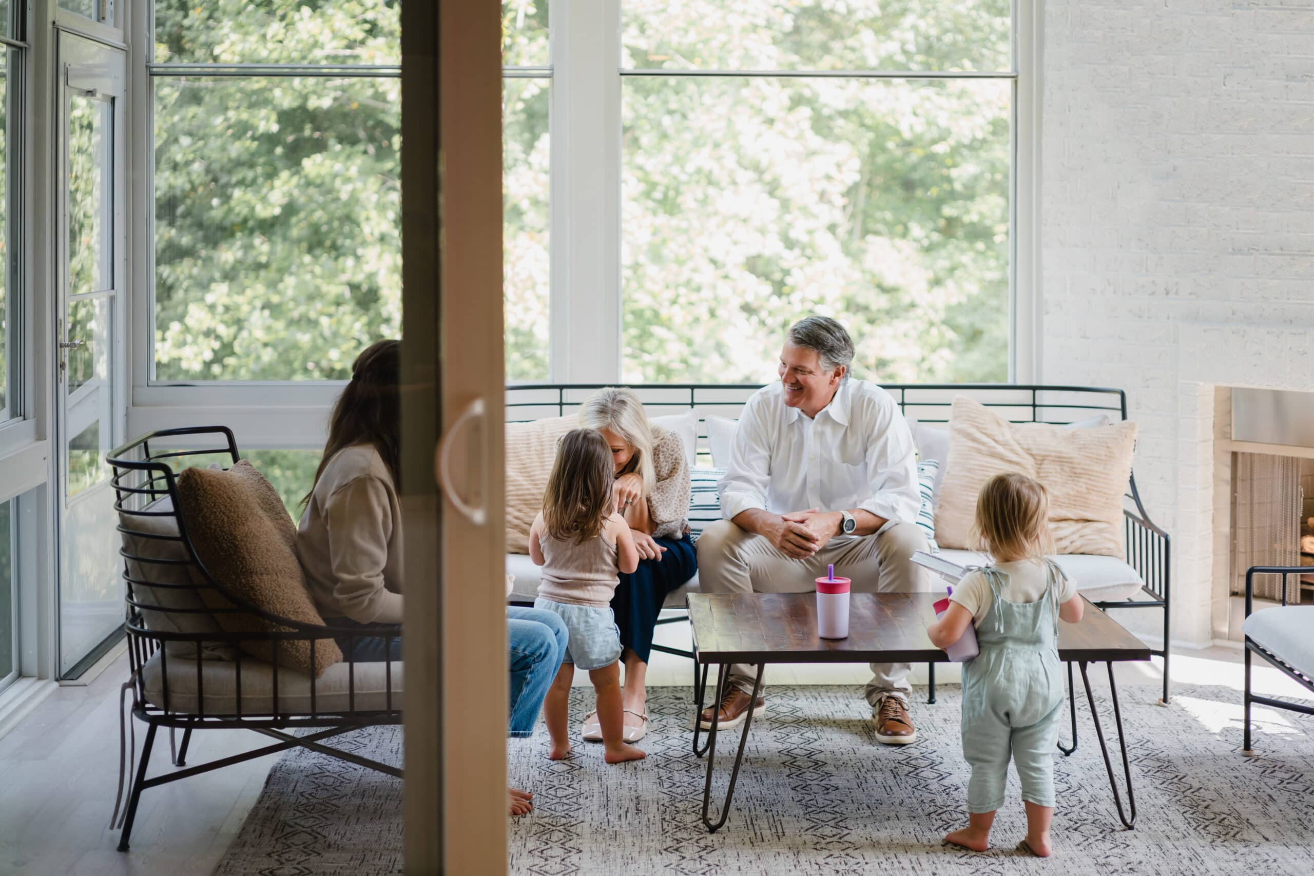Decorative image of a family on a porch with new windows