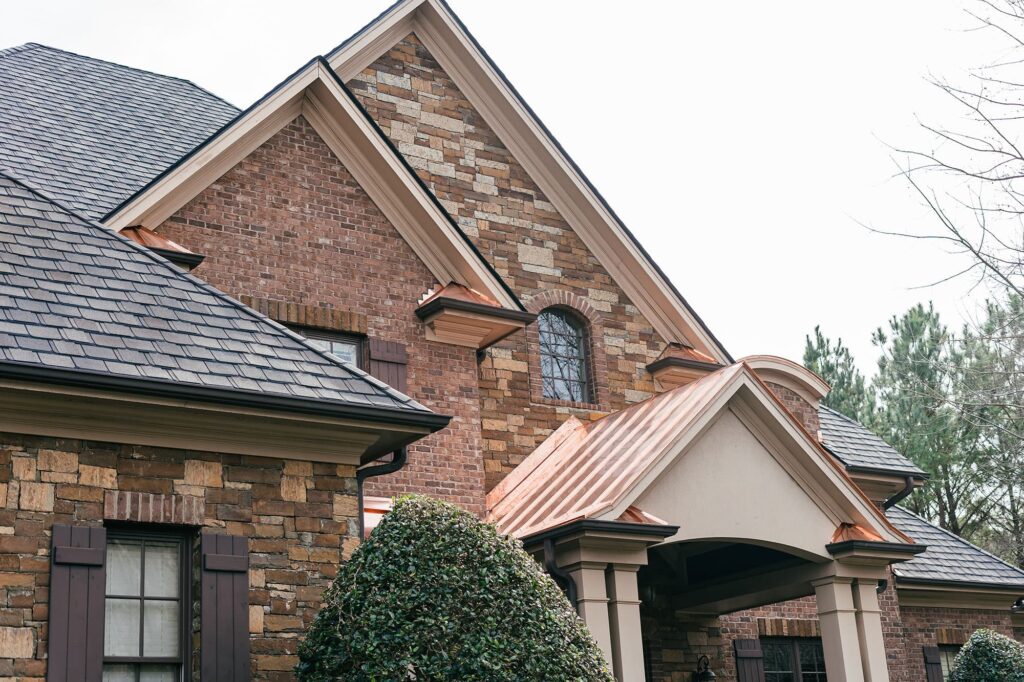 slate roof and copper awning on porch
