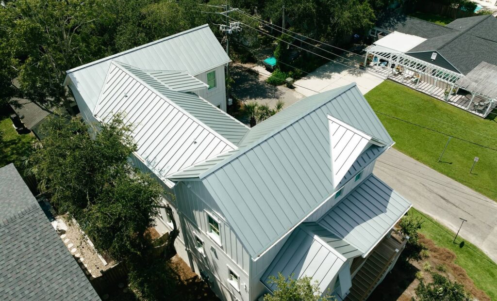 grey standing seam metal roof on coastal home