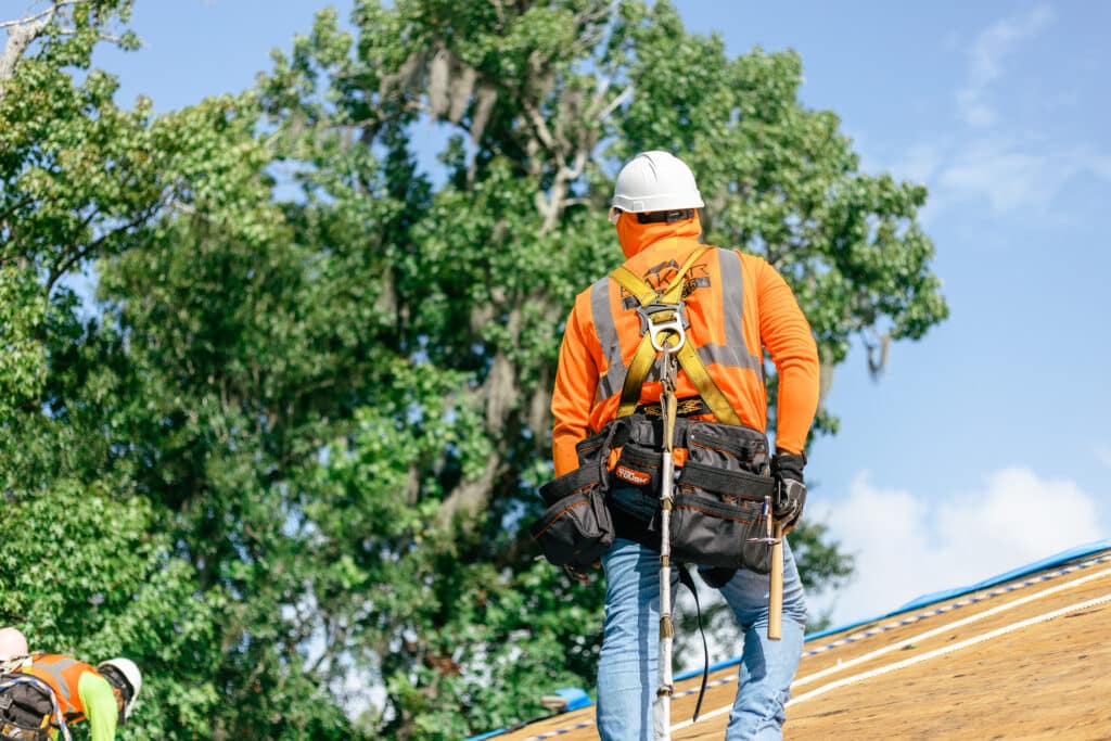 Roofer standing on roof