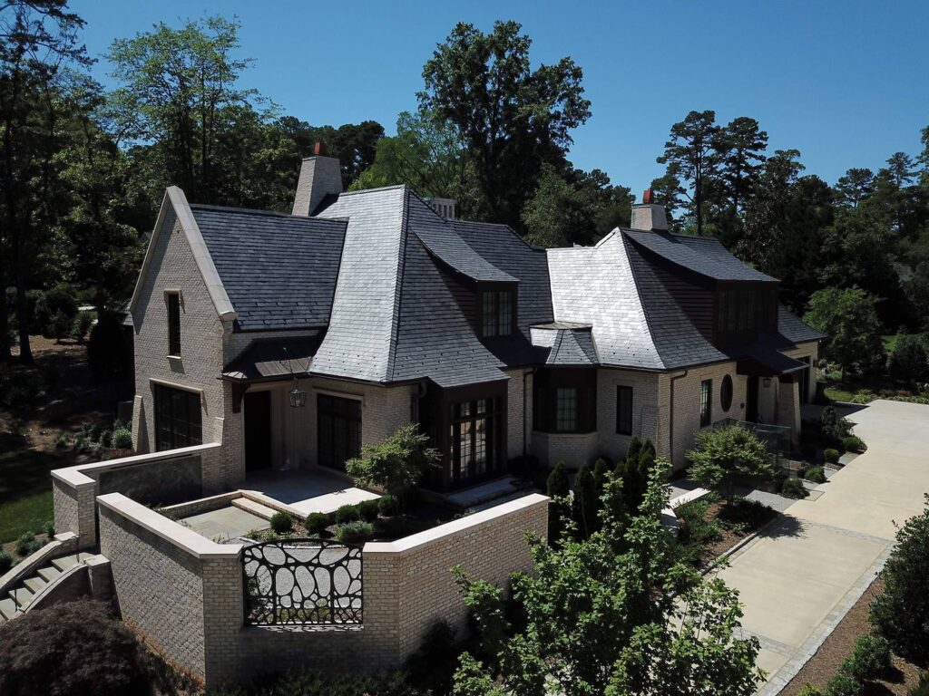Black slate roof on stone home