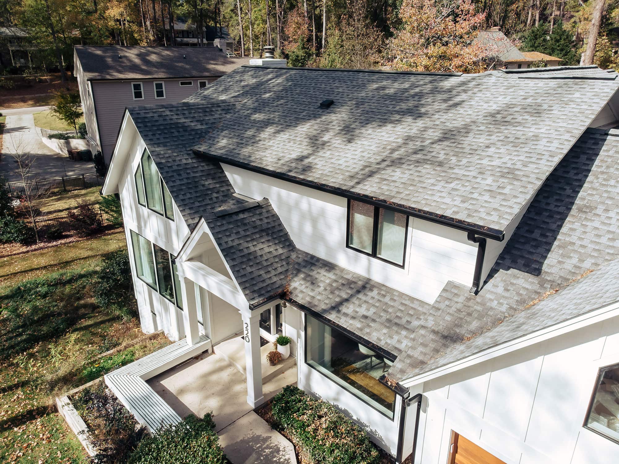Aerial photo of new black gutters with guards
