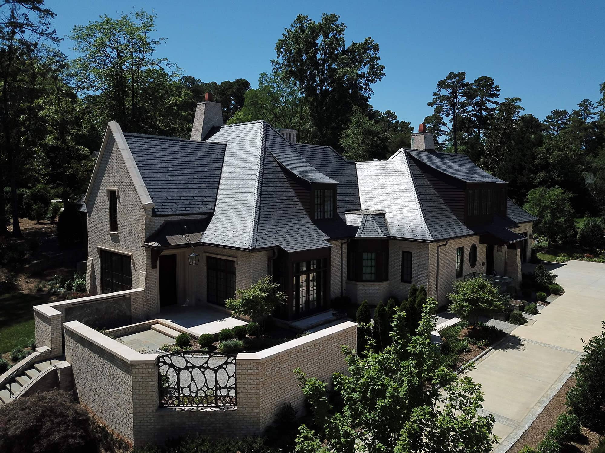 Black slate roof on stone home