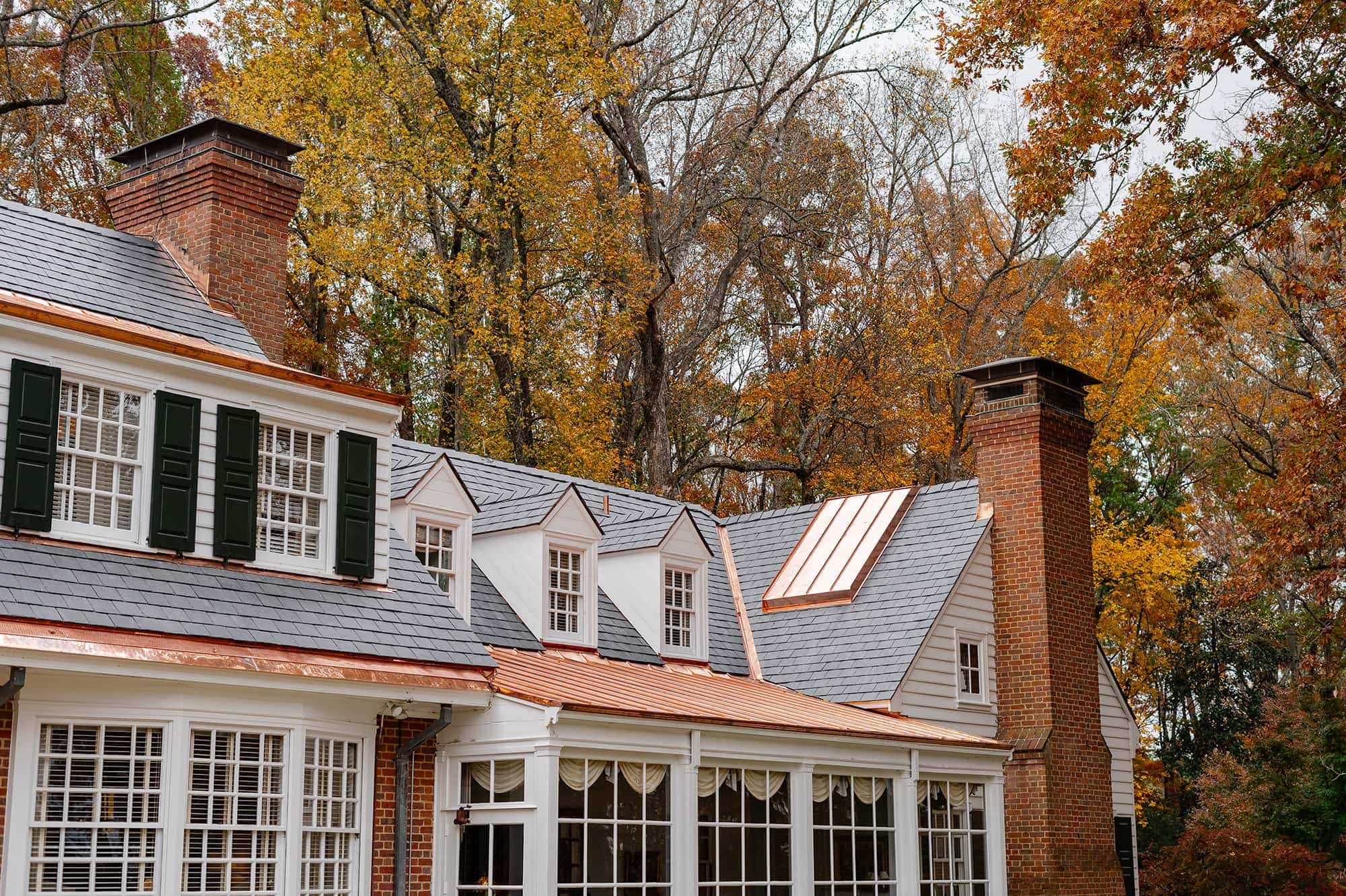 Slate roof with copper accents