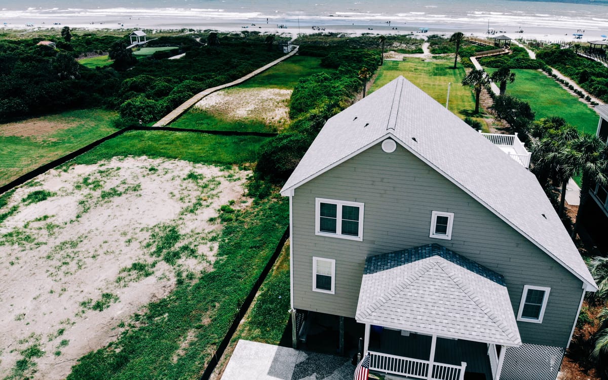 Architectural shingle roof on a raised Lowcountry beach house near the dunes