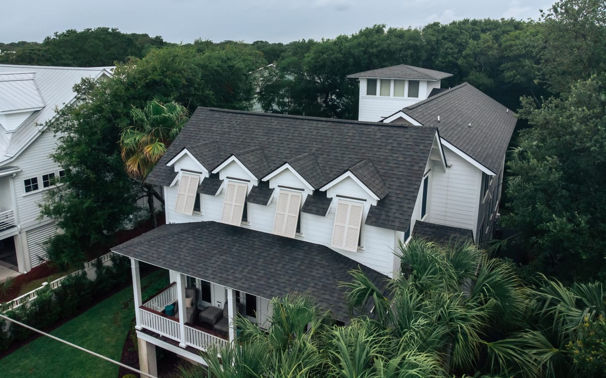 Architectural shingle roof with four dormers and a cupola on Isle of Palms
