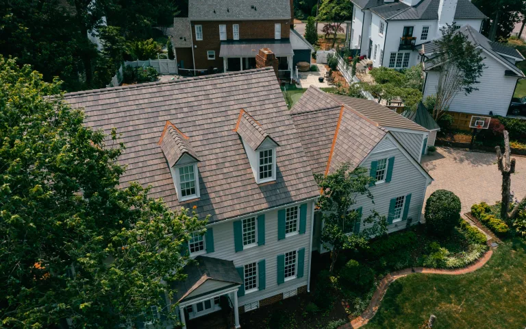 Aerial view of a slate roof on a classic two-story colonial home