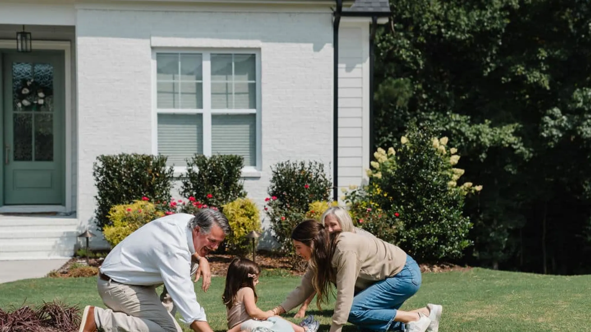 A Baker Home Exteriors consultant walking a Carolina homeowner through their project