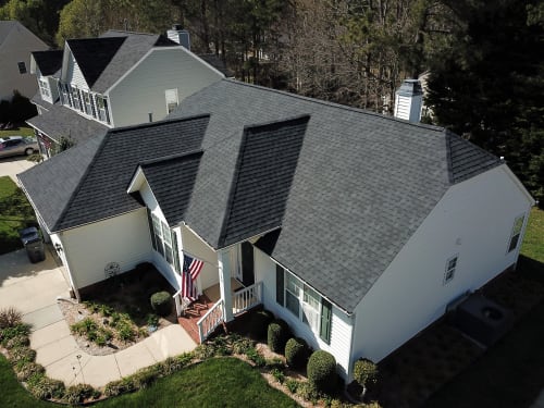Atlas Pinnacle Pristine Black shingle color on a completed roof