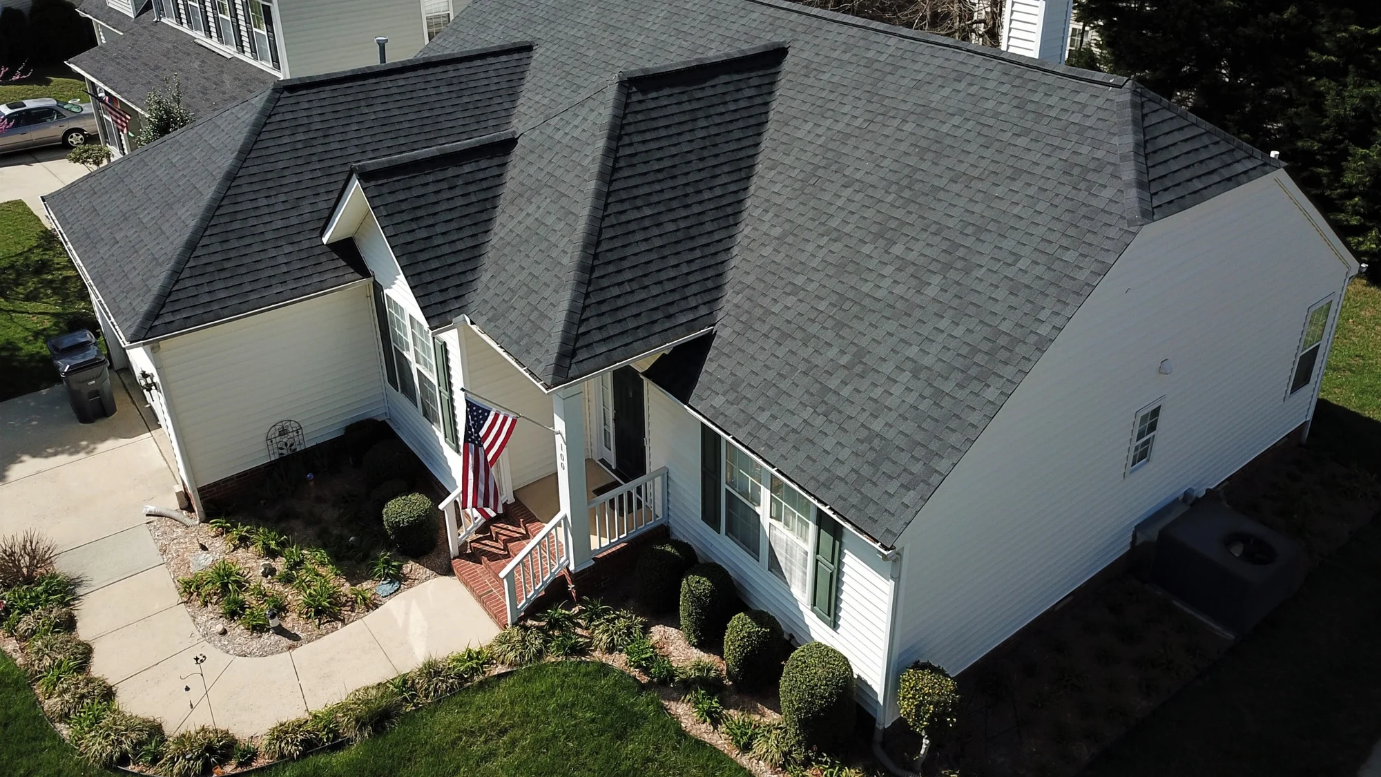 Atlas Pinnacle Pristine Black shingles on a roof replacement by Baker Home Exteriors