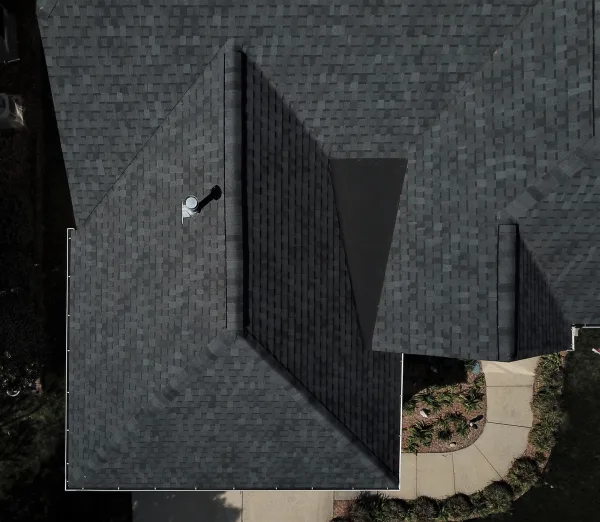 Atlas Pinnacle Pristine Black shingles on a roof replacement by Baker Home Exteriors