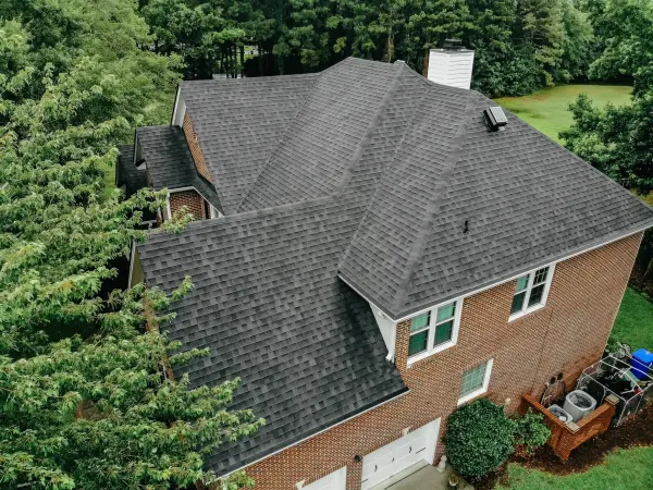 Atlas Pinnacle Pristine Black shingles on a roof replacement by Baker Home Exteriors