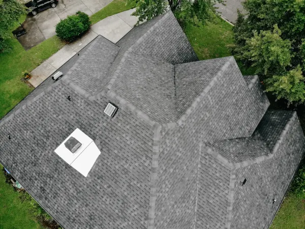 Atlas Pinnacle Pristine Black shingles on a roof replacement by Baker Home Exteriors