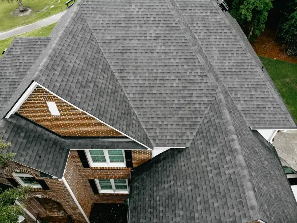 Atlas Pinnacle Pristine Black shingles on a roof replacement by Baker Home Exteriors