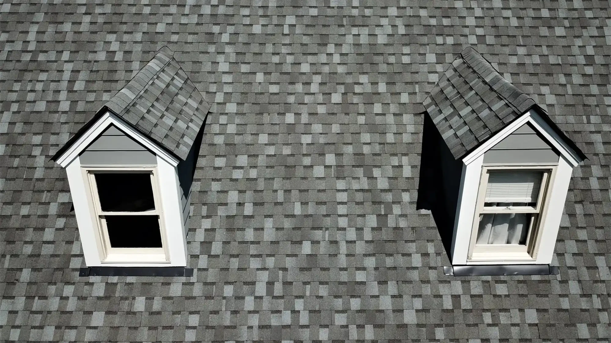 Atlas Pinnacle Pristine Coastal Granite shingles on a roof replacement by Baker Home Exteriors