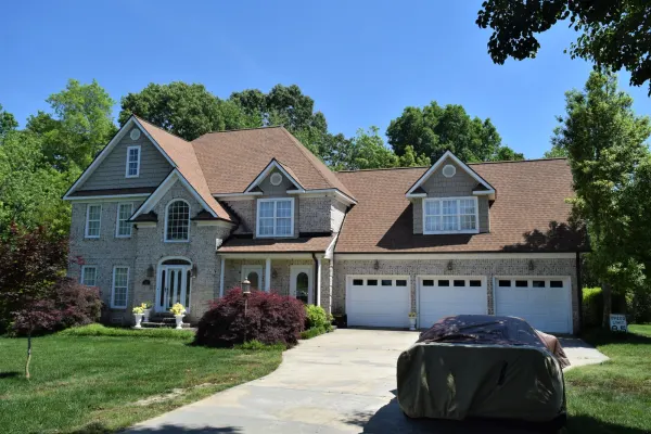 Atlas Pinnacle Pristine Desert shingles on a roof replacement by Baker Home Exteriors