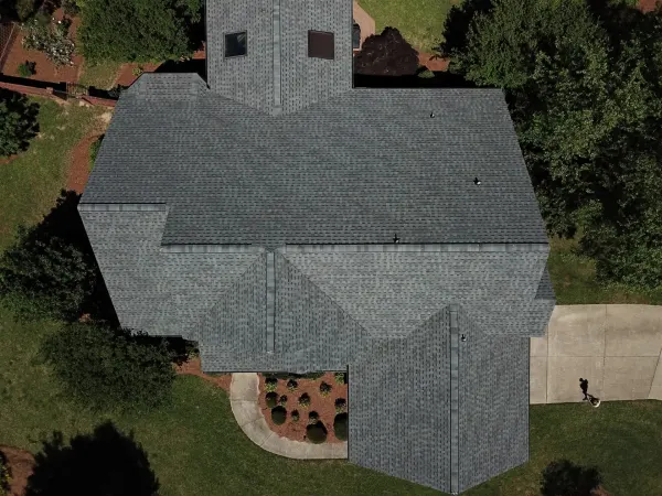 Atlas Pinnacle Pristine Hearthstone shingles on a roof replacement by Baker Home Exteriors