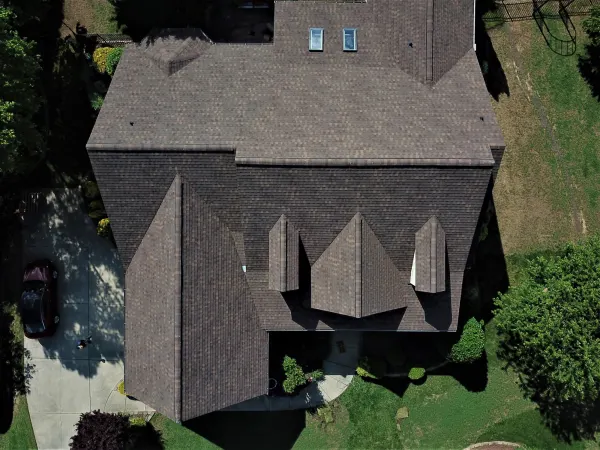 Atlas Pinnacle Pristine Heather shingles on a roof replacement by Baker Home Exteriors