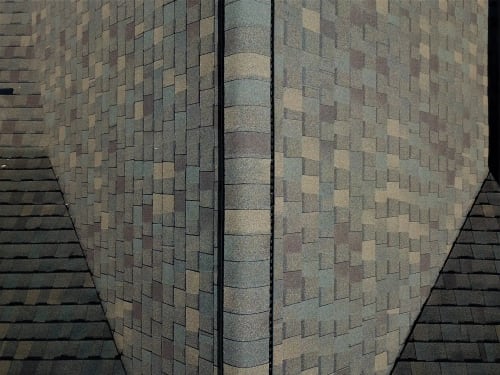 Atlas Pinnacle Pristine Heather shingle color on a completed roof