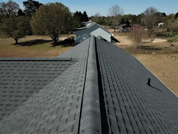 Atlas Pinnacle Pristine Pewter shingles on a roof replacement by Baker Home Exteriors