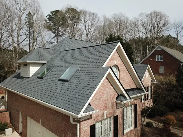 Atlas Pinnacle Pristine Pewter shingles on a roof replacement by Baker Home Exteriors