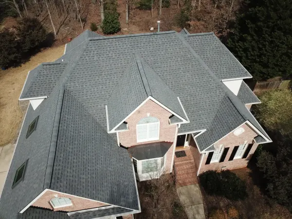Atlas Pinnacle Pristine Pewter shingles on a roof replacement by Baker Home Exteriors
