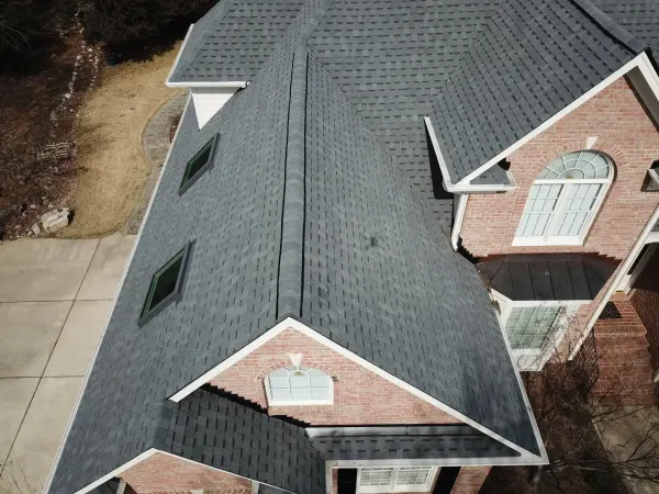 Atlas Pinnacle Pristine Pewter shingles on a roof replacement by Baker Home Exteriors