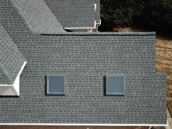 Atlas Pinnacle Pristine Pewter shingles on a roof replacement by Baker Home Exteriors