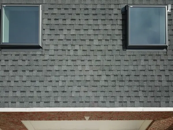 Atlas Pinnacle Pristine Pewter shingles on a roof replacement by Baker Home Exteriors