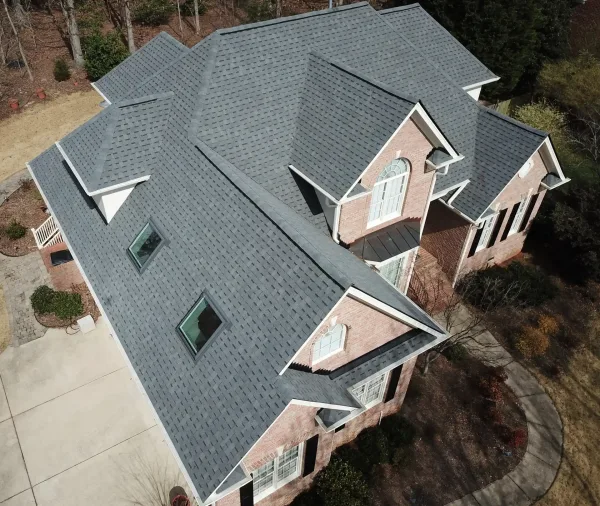 Atlas Pinnacle Pristine Pewter shingles on a roof replacement by Baker Home Exteriors