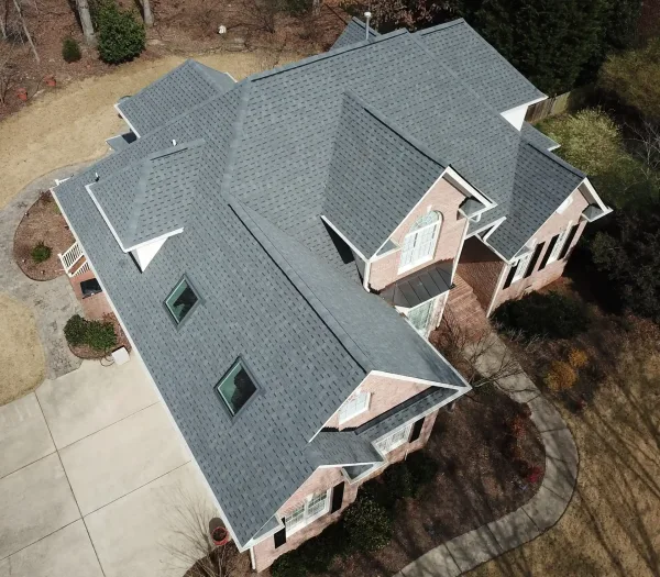 Atlas Pinnacle Pristine Pewter shingles on a roof replacement by Baker Home Exteriors