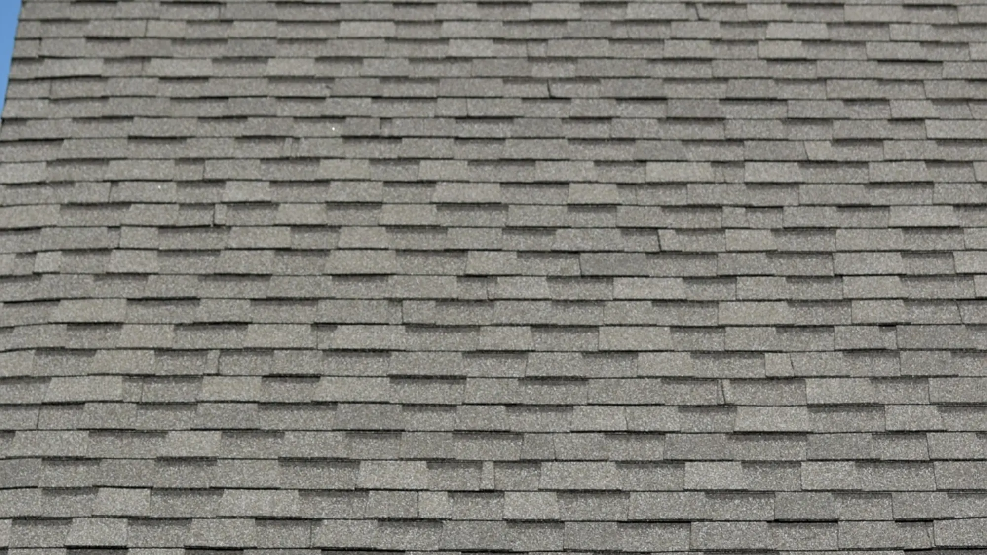 Atlas Pinnacle Pristine Pewter shingles on a roof replacement by Baker Home Exteriors