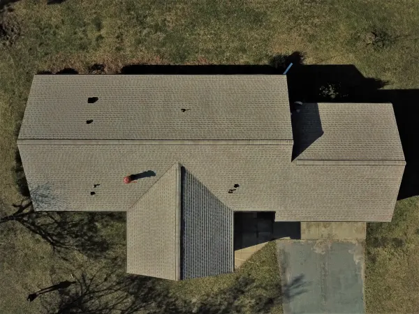 Atlas Pinnacle Pristine Tan shingles on a roof replacement by Baker Home Exteriors