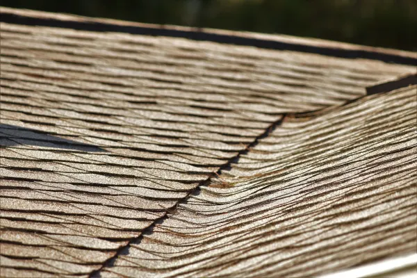 Atlas Pinnacle Pristine Tan shingles on a roof replacement by Baker Home Exteriors