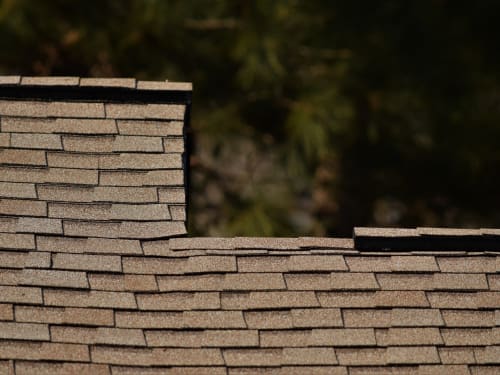 Atlas Pinnacle Pristine Tan shingle color on a completed roof