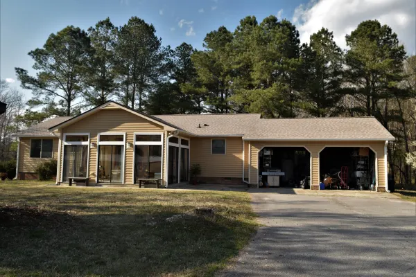 Atlas Pinnacle Pristine Tan shingles on a roof replacement by Baker Home Exteriors