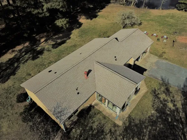 Atlas Pinnacle Pristine Tan shingles on a roof replacement by Baker Home Exteriors