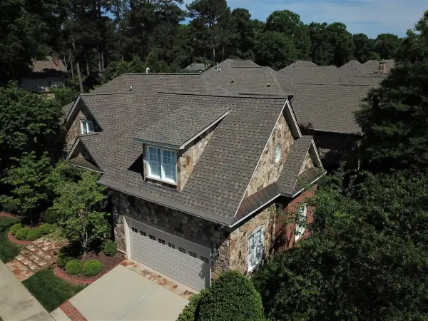 Atlas Pinnacle Pristine Weathered Shadow shingles on a roof replacement by Baker Home Exteriors