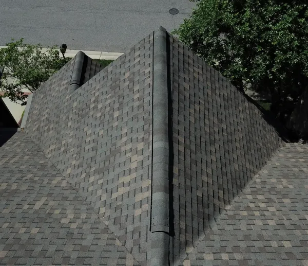 Atlas Pinnacle Pristine Weathered Shadow shingles on a roof replacement by Baker Home Exteriors
