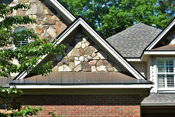 Atlas Pinnacle Pristine Weathered Shadow shingles on a roof replacement by Baker Home Exteriors