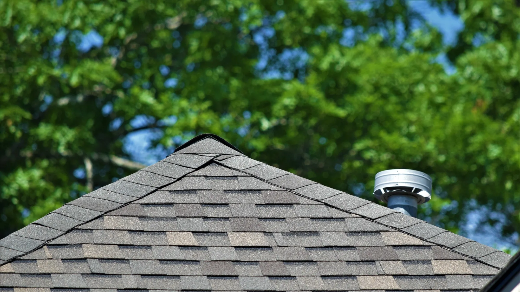 Atlas Pinnacle Pristine Weathered Shadow shingles on a roof replacement by Baker Home Exteriors
