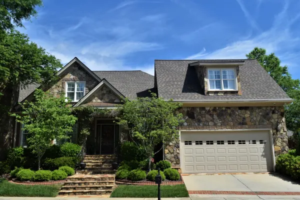 Atlas Pinnacle Pristine Weathered Shadow shingles on a roof replacement by Baker Home Exteriors