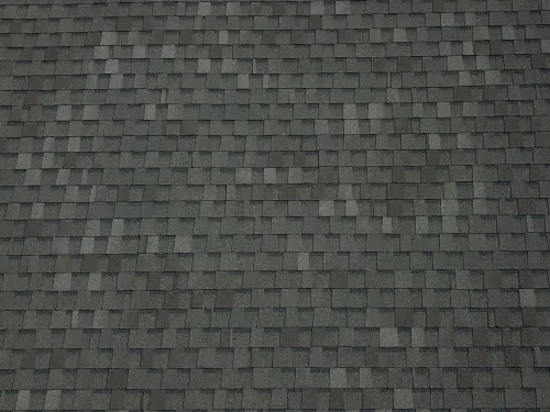 Atlas Pinnacle Pristine Weathered Wood shingle color on a completed roof