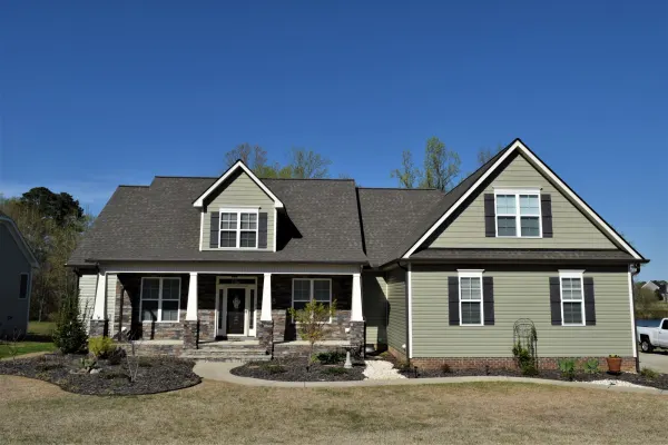 Atlas Pinnacle Pristine Weathered Wood shingles on a roof replacement by Baker Home Exteriors